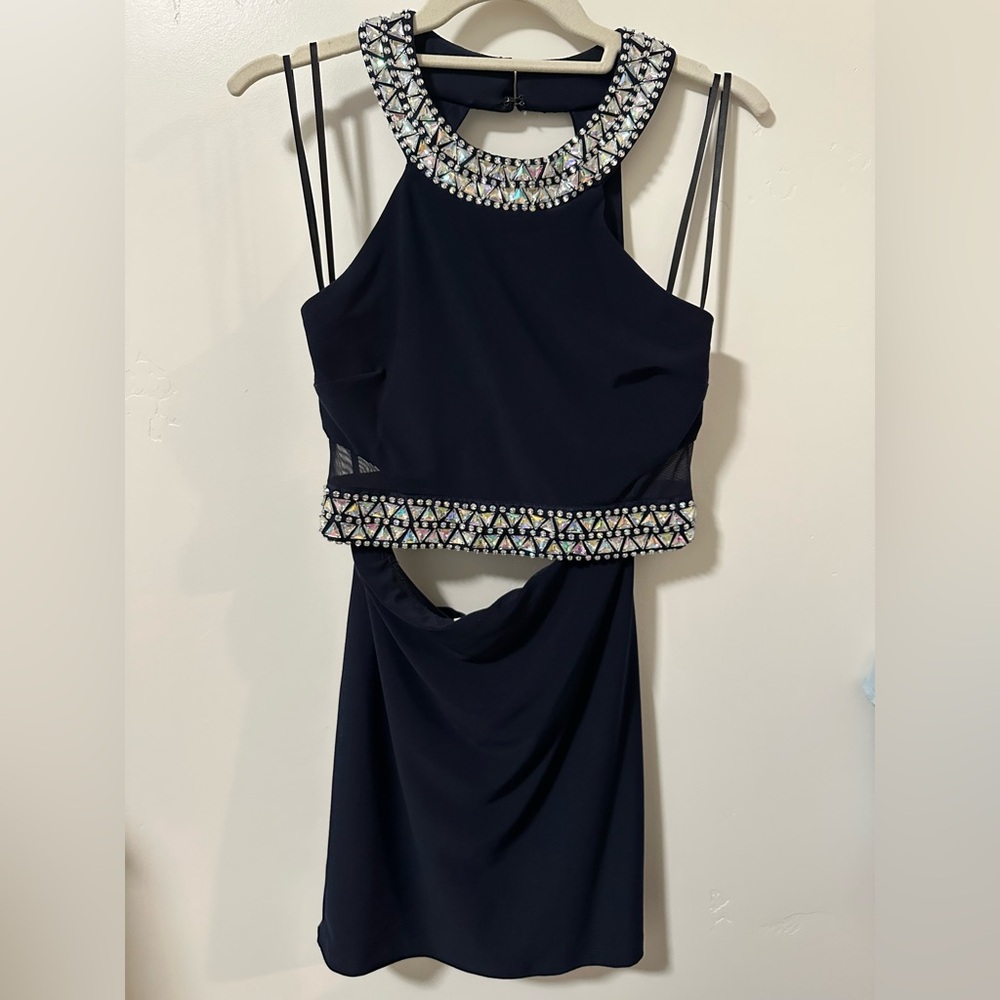 Navy blue two piece dress.
Worn once.